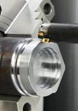 512 Иллюстрация процесса обработки стальной заготовки инструментом Sandvik Coromant с СРП на токарном обрабатывающем центре Каталог SANDVIK COROMANT 2017 Резцы токарные с режущими сменными пластинами Инструментальная оснастка для металлорежущих станков Стр. 